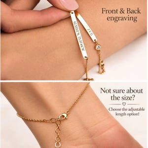 May include: A gold-toned bracelet featuring a thin rectangular bar engraved with the coordinates 42.5553&deg;N, 75.5744&deg;W and a second bar engraved with JVG, accented by a small clear stone. The chain includes an adjustable clasp mechanism.