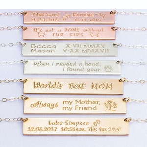 May include: Six gold, silver, and rose gold bar necklaces with personalized engravings. The engravings include names, dates, and messages like "It's not a home without fur-kids" and "World's Best Mom".