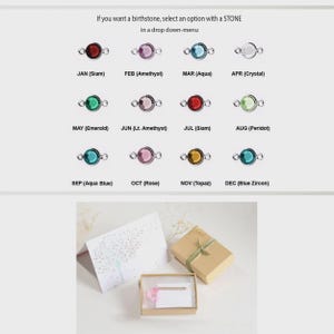 May include: A chart displaying twelve circular birthstone charms in various colors, labeled by month and stone name, including Siam, Amethyst, Aqua, Crystal, Emerald, Peridot, Topaz, and Zircon. Below, a gift box and a greeting card are shown.