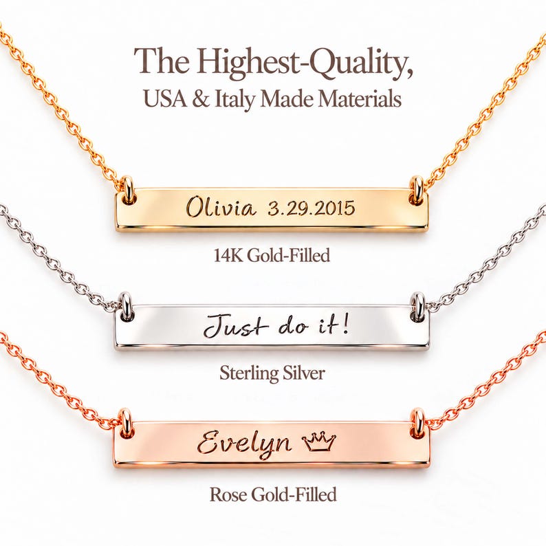 May include: Three horizontal bar necklaces in gold-filled, sterling silver, and rose gold-filled. The gold bar is engraved with Olivia 3.29.2015, the silver with Just do it!, and the rose gold with Evelyn and a crown icon.