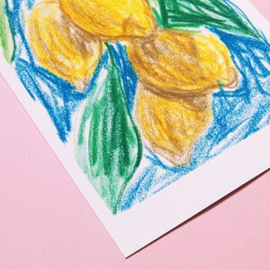 May include: A hand-drawn illustration of lemons with green leaves on a blue background. The drawing is done in a colorful and whimsical style.