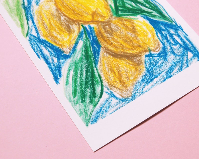 May include: A hand-drawn illustration of lemons with green leaves on a blue background. The drawing is done in a colorful and whimsical style.
