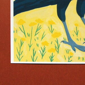 May include: A blue bird with yellow feet stands on a yellow background with green grass and yellow flowers.