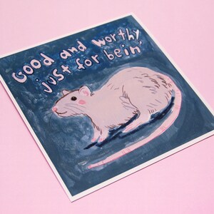May include: A blue and white illustration of a rat with the text "Good and worthy, just for bein'" on a white background.