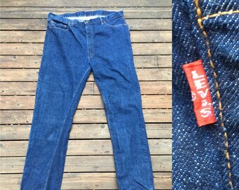 1960s Big E Levis 505 jeans dark blue indigo rinse made in USA America American made 505 0217 black bar stitch Talon zipper zip 505s 42 40