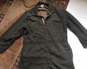 dark green boiler suit