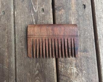 Hand carved wooden comb wide tooth Indian made in India Adivasi tribal traditional folk art wood wide tooth comb carving Asia Asian rustic