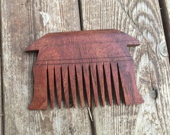 Hand carved wooden comb wide tooth Indian made in India Adivasi tribal traditional folk art wood wide tooth comb carving Asia Asian rustic
