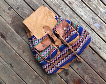 Textile leather rucksack backpack book bag ethnic handwoven tapestry embroidered embroidery brown natural leather travel sling bag shoulder