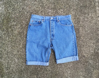 34 Levis 501 cut offs jean shorts blue jeans short frayed rolled hem cuffs cuffed 33 34 35 medium blue made in USA America American made 501