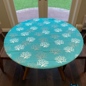 Round Outdoor Fitted Tablecloth. Soil and Stain Resistant. Washable. Select from elastic or drawstring.  Premier Prints Isadella fabric