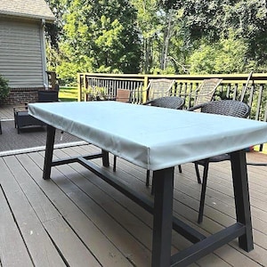 Vinyl Waterproof Rectangular or square Tablecloth - wipeable, flannel-backed.  Drawstring or fitted 5" skirt - customizable