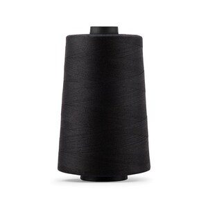 May include: A black spool of thread, tightly wound and cone-shaped, stands against a white background. The thread appears to be a matte finish, with a dark, solid color. The spool has a cylindrical base and a flat top.