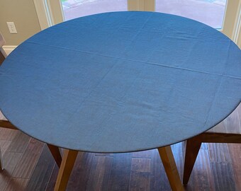 Round  indoor/Outdoor Fitted Tablecloth. Soil and Stain Resistant. Washable. Select from elastic or drawstring.  Jackson Oxford Navy