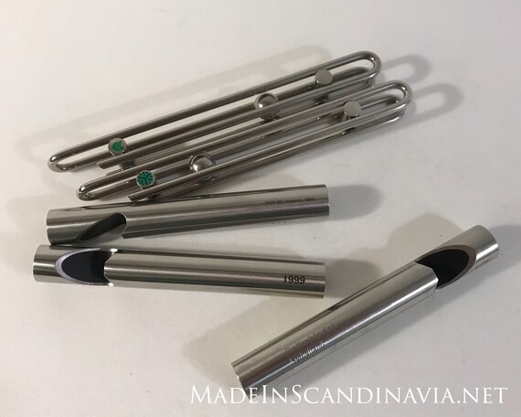 Set of Stelton and Menu bottle openers with logos