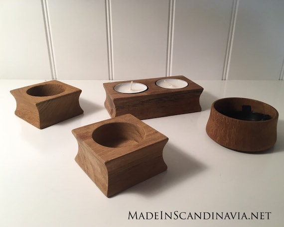 Trip Trap set of teak tealight holders or salt and pepper cellars