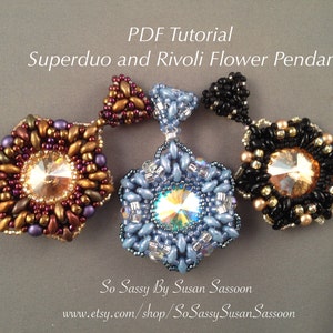 May include: Three beaded flower pendants, each with a different color scheme. The pendants are made with Superduo beads and a Rivoli crystal. The colors are blue, black, and brown.