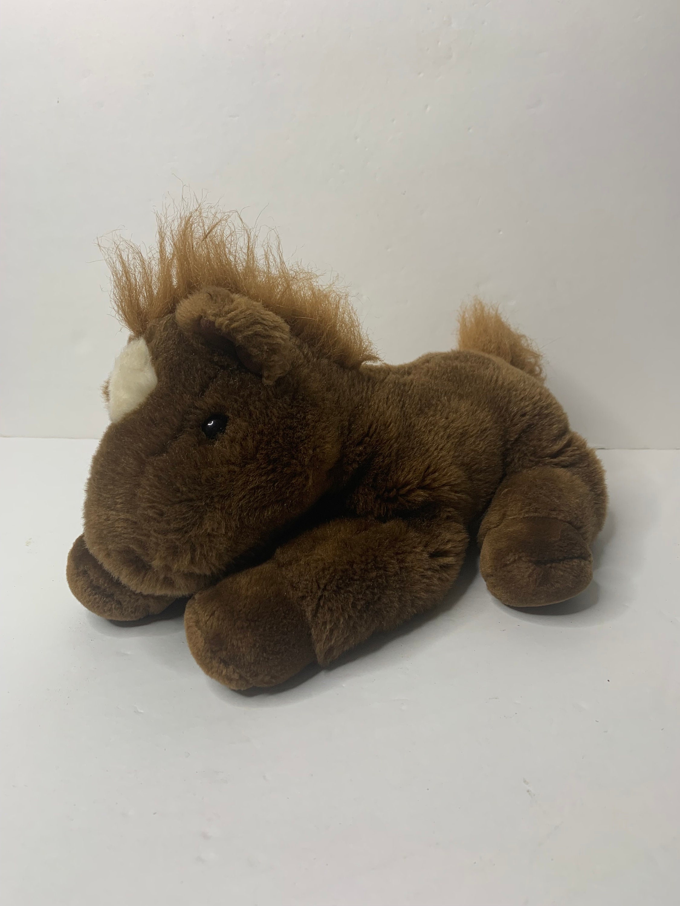 Aurora horse stuffed animal hotsell
