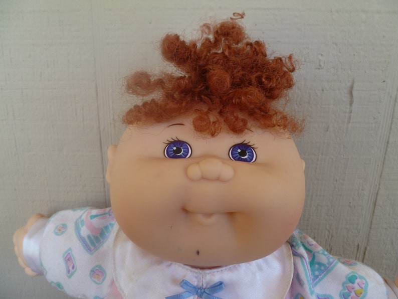 cabbage patch kid with violet eyes