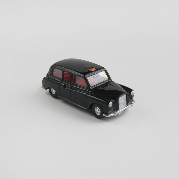 Corgi Austin London Taxi - car black red interior silver chippy industrial English British transport small die cast metal toy vintage