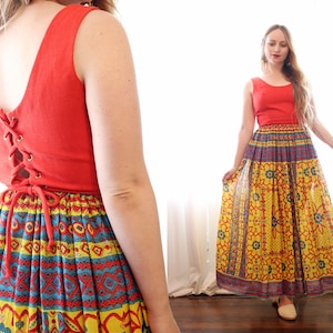 Vintage 1960s psychedelic funky lace up corset back scoop neck sleeveless scarf print skirt maxi dress persimmon red yellow blue hippie 60s