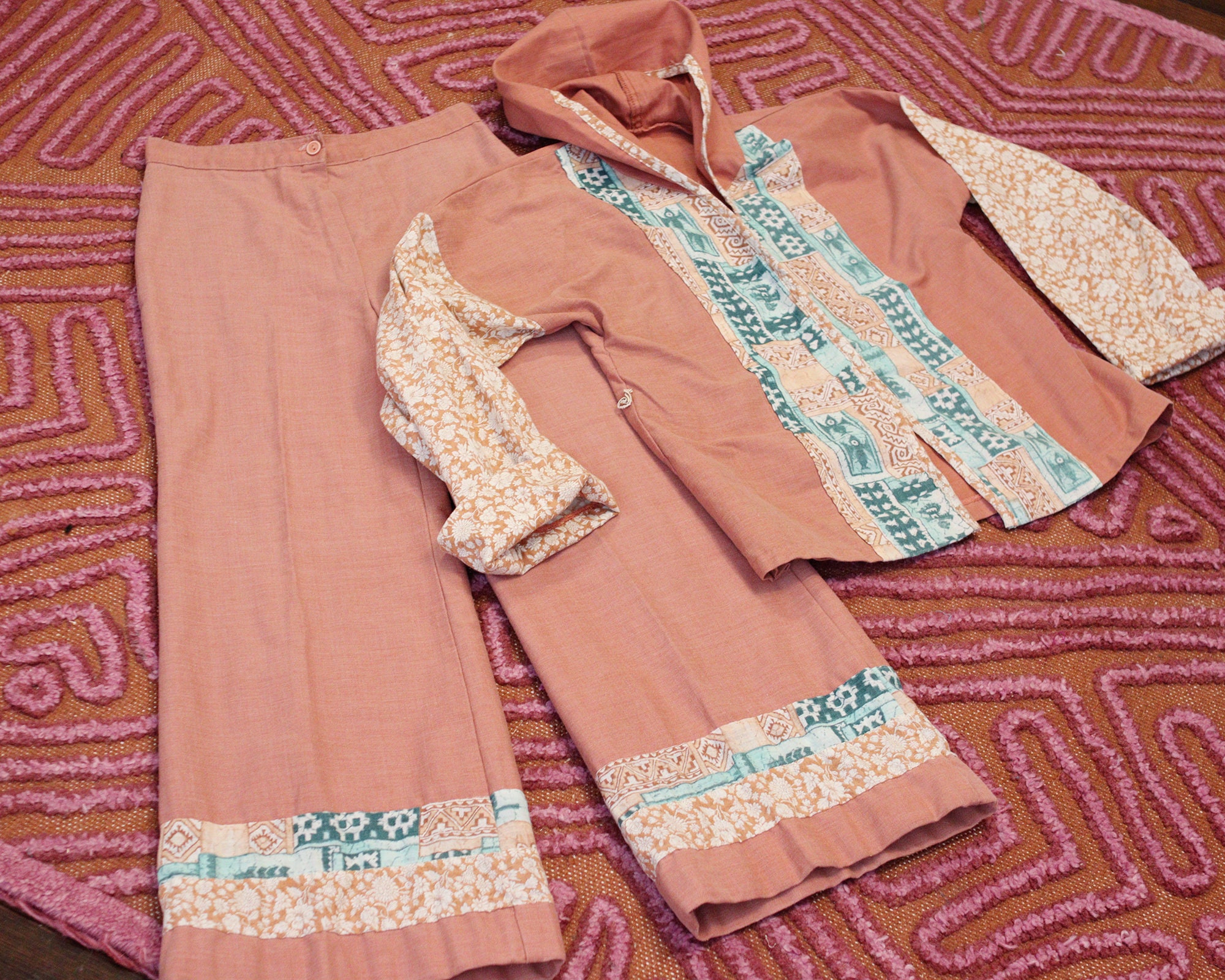 Vintage 1970s dusty coral clay pink colored cotton high waisted wide leg pant hooded jacket folk print set Bohemian hippie style cottagecore