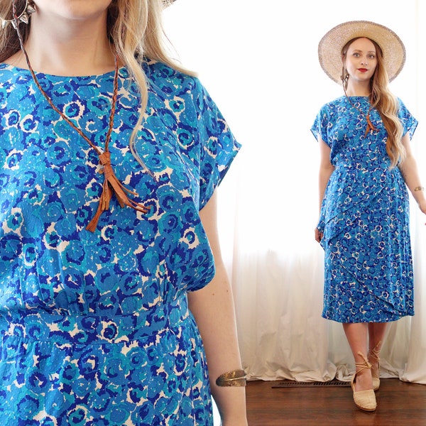 Vintage 1980s 100% silk cyan indigo blue short sleeve drop waist side peplum abstract floral print tea dress Nora Noh