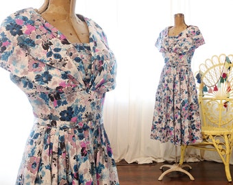 Vintage 1950s white abstract blue black pink floral wide collar short sleeve mid century fit and flare party dress 50s