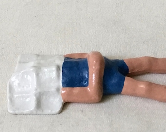 Man Lying on the Beach with Newspaper, 2.25" collectible figurine, model train layout, hand-painted reproduction of vintage toy figure