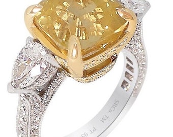 9.31カラットの非加熱イエローサファイアリング。プラチナと18カラット