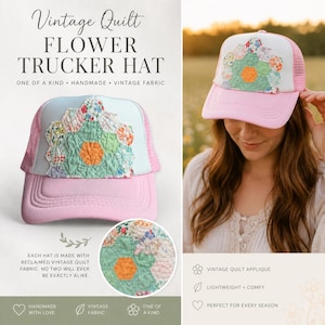 May include: A pink trucker hat featuring a light blue front panel with a central floral quilt applique. The applique consists of a hexagonal orange center surrounded by light green and multi-colored floral fabric patches. The hat has pink mesh sides.