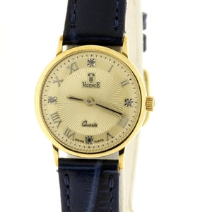 Reloj de pulsera Vicence Quartz Swiss Movement 14K Caja de oro con fondo de acero inoxidable Numeros romanos Etsy Mexico
