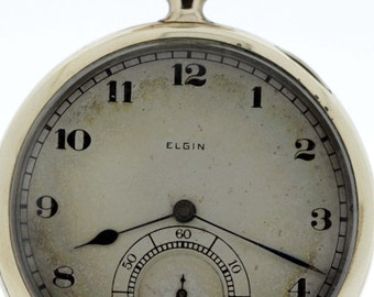 Reloj de bolsillo Elgin chapado en oro