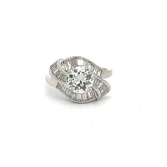 Stunning 1950's Ring with GIA Certified Center Dia