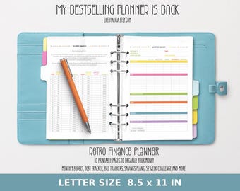 May include: A light blue six-ring binder planner open to pages with financial tracking charts, including a 52-week savings challenge and monthly budget. An orange pen rests on the left page. Text reads: MY BESTSELLING PLANNER IS BACK, RETRO FINANCE PLANNER, 10 PRINTABLE PAGES TO ORGANIZE YOUR MONEY, MONTHLY BUDGET, DEBT TRACKER, BILL TRACKERS, SAVINGS PLANS, 52 WEEK CHALLENGE AND MORE!, LETTER SIZE 8.5 x 11 IN.