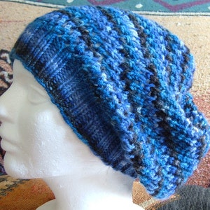 wool slouchy beanie, a textured knit with organic hand dyed artisan yarn in mixed blues. Wearable art, one of a kind winter hat