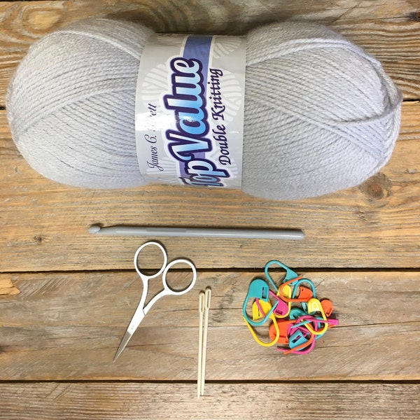 Beginner Crochet Starter Kit Containing All Essential Items To Get You Started - DK yarn, 6mm hook, scissors, stitch markers, yarn needle
