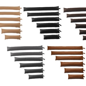 May include: Set of 10 door draft stoppers in three colors: brown, black, and gray. The stoppers are made of fabric and are designed to block drafts from under doors.