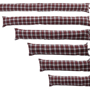 May include: Set of six red, white and black plaid draught excluders in various sizes. The draught excluders are made of fabric and have a sewn-in loop at one end.
