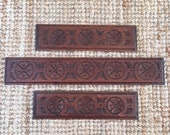 Set of elegant French vintage carved wooden corner garnitures decorative details intricately carved patinated wood of great quality