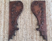 Elegant French antique carved wooden brackets or garnitures with naturalist decorative motifs intricately carved patinated wood