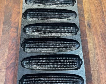 Vintage seasoned cast iron 7 stick corn pan