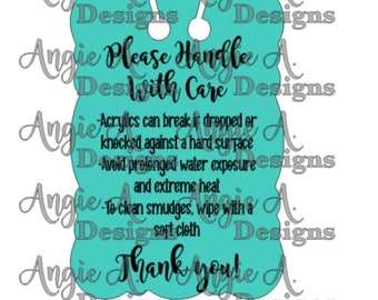 May include: A teal blue sign with rounded edges and a hole at the top for hanging. The sign reads "Please Handle With Care" and includes instructions for caring for acrylic items. The sign also says "Thank You".