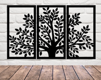 May include: Three black metal wall decor panels featuring a silhouette of a tree with leaves. The panels are arranged side-by-side and are mounted on a white brick wall.