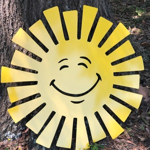 Large Size metal sun with happy face. Powder coated yellow.