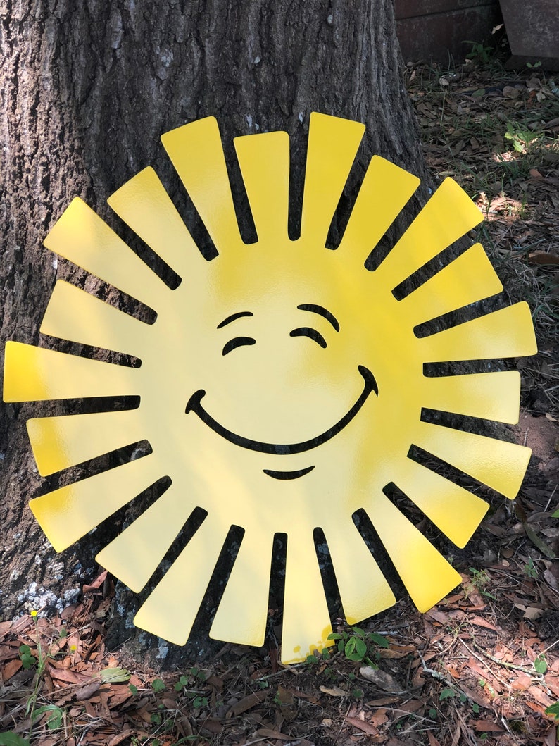 Large Size metal sun with happy face. Powder coated yellow.