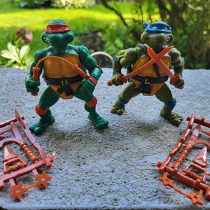 Vintage 80s TMNT 1988 Teenage Mutant Ninja Turtles Michelangelo and Leonardo Hard Head Action Figures Unpunched Weapons