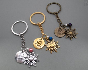 Rapunzel Live Your Dream Rapunzel Sun Charm Keychain, Fairy Tale Princess