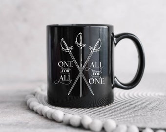 Taza de los tres mosqueteros / Taza de citas literarias / Todo para uno y uno para todos / Taza de café literaria / Taza libresca / Taza de lector