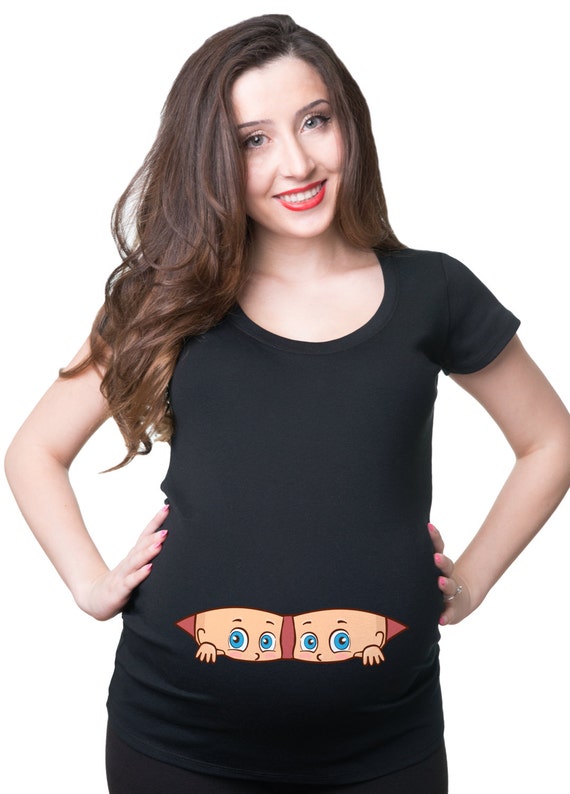 maternity shirt with baby peeking out of belly